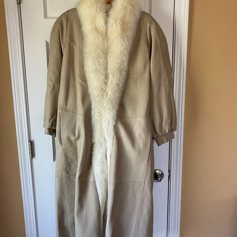Never worn beige leather jacket with cream fox fur trim.